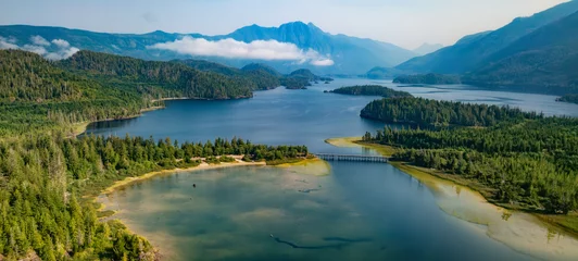 Zelfklevend Fotobehang Vibrant lake and mountain landscape in Canadian Nature. © edb3_16