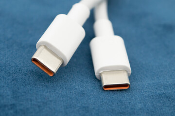 USB-C view of white USB-C plug on dark background