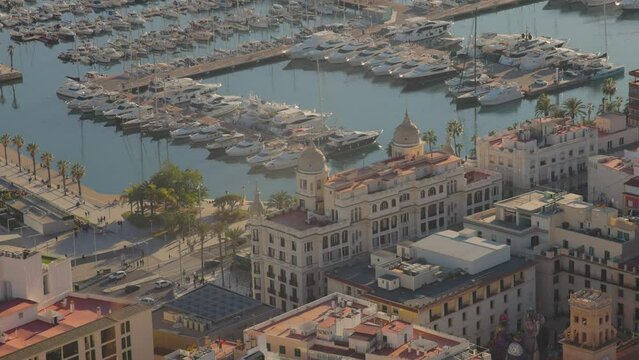 Sunset view from the mountain to the marina in Alicante and to Casa Carbonell, Costa Blanca, Spain.