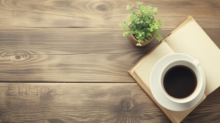 Open book with coffee cup and potted plant on wooden table - obrazy, fototapety, plakaty