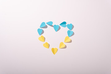 Ukraine hearts yellow blue flag soft light top view white background colorfull love