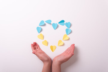 Ukraine heart flag yellow blue hands kid children little background white 