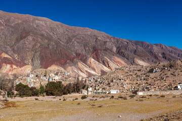 Cemetery at the foot of the Painter's Palette mountain in Maimara, Quebrada de Humahuaca, Jujuy, Argentina, South America