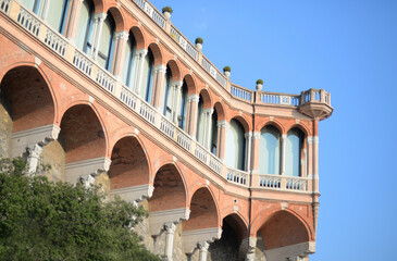 Neogothic Villa Mylius, an old stylish building with arcades, balconies and terraces in Genoa,...