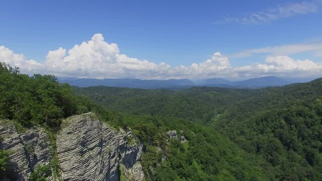 Agurskoe ravine and mountains at summer sunny day. Aerial view