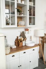White kitchen interior with wooden worktop