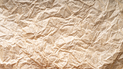 Crumpled brown paper sheet isolated.
