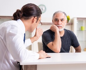 Financial advisor giving retirement advice to old couple
