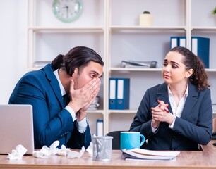 Two employees suffering at workplace
