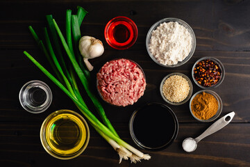 Overhead View of Raw Biang Biang Noodle Ingredients: Uncooked ingredients for Chinese belt noodles with hot and spicy chili oil sauce
