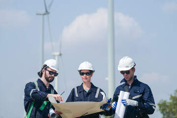 engineers working in fieldwork outdoor. Workers walking and inspect construction and machine around project site. Wind turbine electrical of clean resource enerdy and environment sustainable.