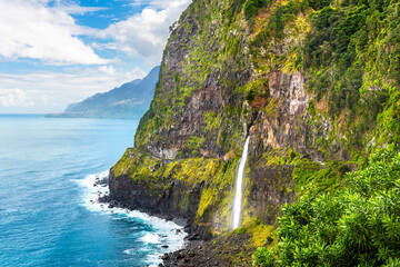 Beautiful view of Cascata do Veu da Noiva waterfall near Porto Moniz and Seixal. Madeira, Portugal