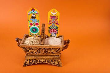 Losar Tibetan New Year. A Chemar box for Tibetan New Year with roasted barley and barley flour.