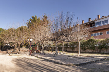 A playground with sandboxes and swings