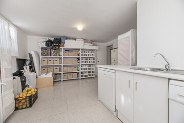 A room dedicated to a storage room and laundry room on the ground floor of a single-family home