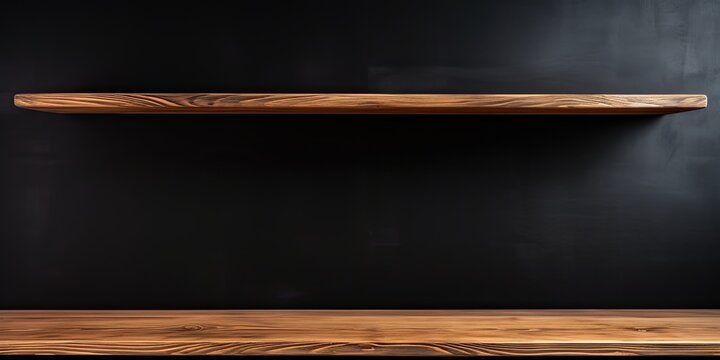 Wooden shelf against black backdrop.