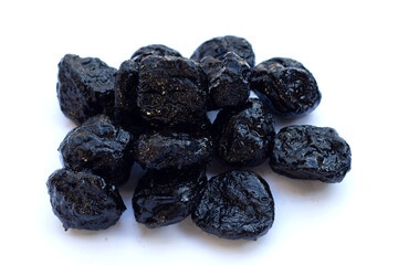 Prunes or dried plums on white