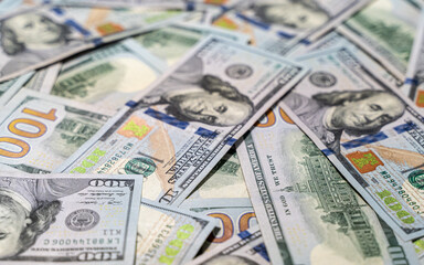 Close up view of cash money, 100 one hundred US dollar bills, 50 US dollar bills, 20  US dollar bills, lots of cash. 