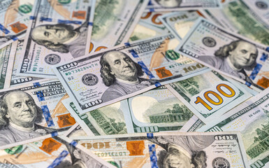 Close up view of cash money, 100 one hundred US dollar bills, 50 US dollar bills, 20  US dollar bills, lots of cash. 