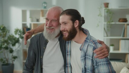 Family conversation: young and elderly men talk about life, psychological support for each other, cross-generational dialogue, heartfelt consolation, advice and wisdom, warm communication