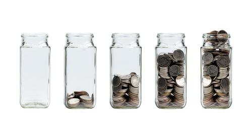 Growing savings concept. Glass jar of coins isolated on white background. Jars with different level...