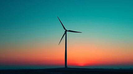 Obraz premium single wind turbine silhouette against a clear, gradient sky, symbolizing renewable energy and ecology