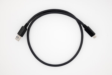USB A to USB C adapter cable close-up in black