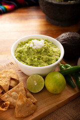 Guacamole. Avocado dip sauce, one of its many ways of consuming it is spread on tortilla chips also called Nachos. Mexican easy homemade sauce recipe very popular.