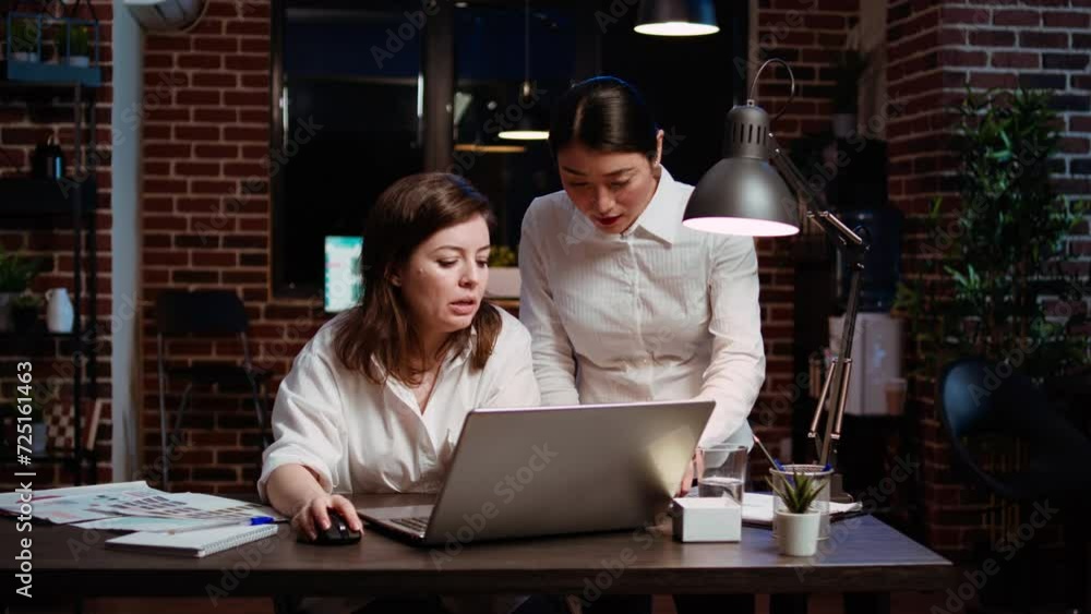 Poster worker brainstorming with colleague to write email at computer desk, finalizing deal with business p