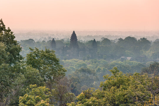 Angkor Wat temple at sunset in the middle of the jungle, Cambodia, Southeast Asia