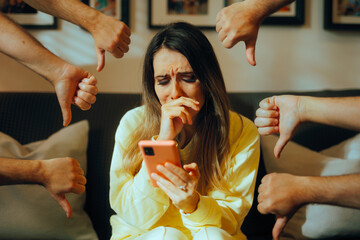 Unhappy Woman Receiving Online Bullying and Negative Internet Feedback. Girl crying suffering after virtual harassment and humiliation
 - obrazy, fototapety, plakaty