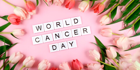 World Cancer Day text with pink flowers and pink background