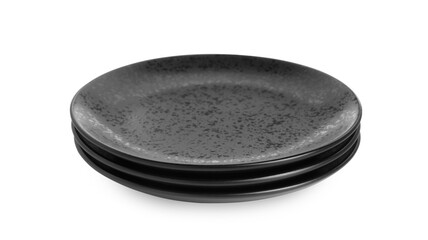 Three black ceramic plates isolated on white