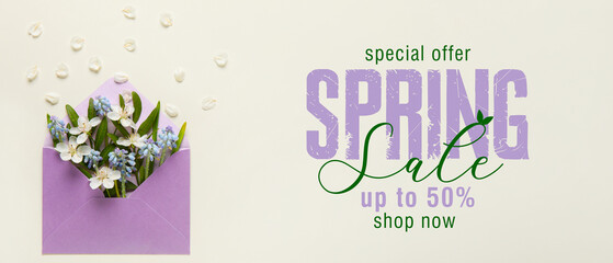 Envelope and beautiful spring flowers on light background. Spring Sale