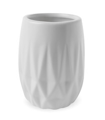 Bath accessory. Ceramic toothbrush holder isolated on white