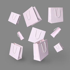 Pink shopping bags falling on grey background