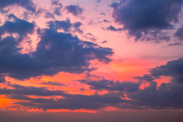 Dark sky with bright clouds at sunset. Evening sky background, dramatic sky landscape