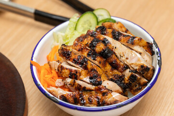 Close-Up of a Freshly Grilled Chicken Noodle Bowl