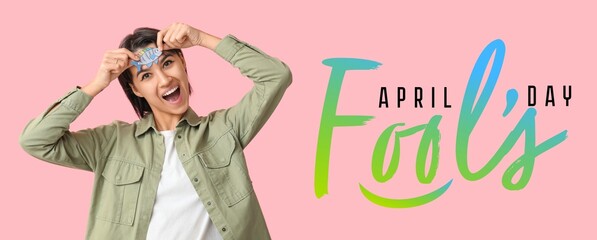 Banner for April Fools' Day with funny young woman on pink background - obrazy, fototapety, plakaty
