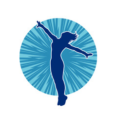 Silhouette of a slim female in dance pose. Silhouette of a woman dancing.