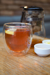  lemon tea and honey on table 