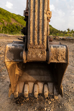 Close-up of excavator bucket at construction site