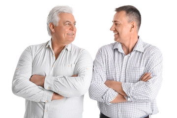 Mature brothers on white background