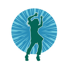 Silhouette of a slim male in dance pose. Silhouette of a man dancing.