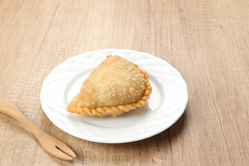 Jalangkote, Indonesian traditional snack filled with egg, carrot, potato, rice noodles. Served with chili sauce
