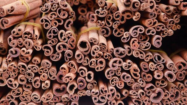 stack of Cinnamon sticks selling at spice shop 