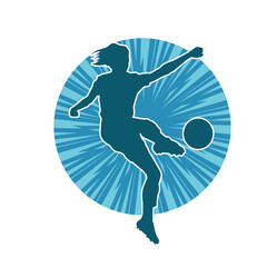 Silhouette of a female soccer player kicking a ball. Silhouette of a football player woman in action pose.