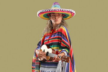 Mature woman in sombrero hat playing guitar on color background. Mexico's Day of the Dead (El Dia...
