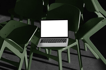 laptop mockup on chair with blank screen