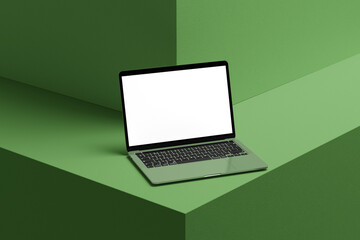 laptop on green background